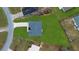 Overhead view of a single-Gathering home on a large lot, revealing the roof and lawn at 2480 Sw 147Th Lane Rd, Ocala, FL 34473