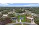 A birds eye view of a single Gathering home nestled in a lush green landscape at 2480 Sw 147Th Lane Rd, Ocala, FL 34473