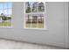 Bright living room with large windows at 2480 Sw 147Th Lane Rd, Ocala, FL 34473