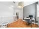 Bright hallway featuring an office nook, a desk, and access to multiple rooms at 2504 Helen Ave, Orlando, FL 32804