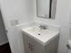 Cozy bathroom with a modern sink and updated vanity at 2727 W Oak Ridge Rd # 5-6, Orlando, FL 32809
