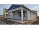 Charming one-story home featuring large windows and a welcoming front porch at 2953 Sailhouse Dr, St Cloud, FL 34771