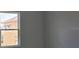 A bright new room is shown, with a window with a view of the construction neighborhood at 2953 Sailhouse Dr, St Cloud, FL 34771