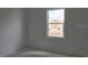 Bright, unfinished room featuring a large window with a view of the neighborhood at 2953 Sailhouse Dr, St Cloud, FL 34771