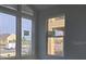 View from window of neighborhood homes, trees, and community landscape at 2953 Sailhouse Dr, St Cloud, FL 34771