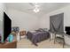 Bedroom with neutral color scheme and tile flooring at 322 Dagama Ct, Kissimmee, FL 34758