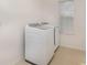 Laundry room featuring side by side washer and dryer and window at 322 Dagama Ct, Kissimmee, FL 34758