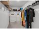 Walk-in closet features clothing racks and built-in shelving for storage at 3270 Water Sprite St, Orlando, FL 32808