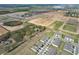 Aerial view of new construction neighborhood that highlights the community layout at 421 Sedgewick Dr, Davenport, FL 33837