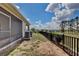 This backyard is fully fenced, ready for pets and play! at 421 Sedgewick Dr, Davenport, FL 33837