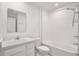 Clean bathroom with modern fixtures, white cabinets, and a shower-tub combo at 421 Sedgewick Dr, Davenport, FL 33837
