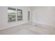 Bright bedroom with a large window and neutral walls is the perfect place to relax and unwind at 421 Sedgewick Dr, Davenport, FL 33837