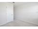This is a spacious bedroom with neutral carpeting and fresh paint at 421 Sedgewick Dr, Davenport, FL 33837