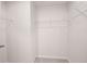 Walk-in closet featuring wire shelving for ample storage and organization at 421 Sedgewick Dr, Davenport, FL 33837