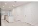 Modern, light-filled kitchen featuring stainless steel appliances, white cabinets, and granite countertops at 421 Sedgewick Dr, Davenport, FL 33837