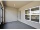 A cozy, screened patio offers a view of the outdoors at 421 Sedgewick Dr, Davenport, FL 33837