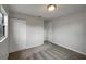 This bedroom has gray walls, carpet and a closet, providing a cozy and functional space at 4561 Evers Pl, Orlando, FL 32811