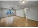 Inviting living room with tile floors and neutral walls, offering a versatile space at 4561 Evers Pl, Orlando, FL 32811