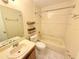 Neutral bathroom with a tub, shower, and sink with neutral tile floor at 4882 S Semoran Blvd # 1408, Orlando, FL 32822