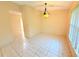 Dining room featuring tile flooring and view of the front of the property at 4882 S Semoran Blvd # 1408, Orlando, FL 32822