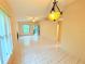 Spacious living room with tile flooring, fireplace, and view of the front of the property at 4882 S Semoran Blvd # 1408, Orlando, FL 32822