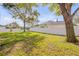 Well-maintained backyard with lawn and privacy fence at 524 Quail View Ct, Debary, FL 32713