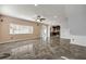 Bright and airy living space with sliding glass doors, recessed lighting, and modern flooring at 524 Quail View Ct, Debary, FL 32713