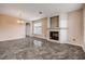 Bright living area featuring a modern fireplace and large windows at 524 Quail View Ct, Debary, FL 32713