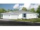 Charming single-story home with a two-car garage and a well-maintained lawn, perfect for comfortable living at 5350 Spoonflower Ct, St Cloud, FL 34771