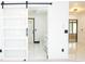 View of a modern sliding door into a spacious bathroom with a pristine vanity at 5443 Aeolus Way, Orlando, FL 32808