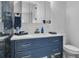 Bathroom features modern vanity, white countertops, and contemporary fixtures at 599 Glendevon Dr, New Smyrna Beach, FL 32168