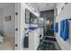 Lavish bathroom features marble floors, vessel sink, decorative mirrors, and updated shower at 599 Glendevon Dr, New Smyrna Beach, FL 32168