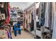 Spacious walk-in closet features custom shelves and storage at 599 Glendevon Dr, New Smyrna Beach, FL 32168