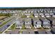 Planned residential community with modern homes, green spaces, and a recreational area for active lifestyles at 6404 Pine Fork Aly, St Cloud, FL 34771