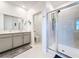 Modern bathroom with a glass-enclosed shower and a separate toilet room at 6404 Pine Fork Aly, St Cloud, FL 34771