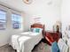 Bright bedroom with stylish decor, featuring a cozy bed and elegant wooden furniture at 6404 Pine Fork Aly, St Cloud, FL 34771