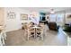 Spacious dining room and living room with natural light and modern flooring at 6404 Pine Fork Aly, St Cloud, FL 34771