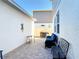Outdoor patio space with comfortable seating arrangements and charming decor at 6404 Pine Fork Aly, St Cloud, FL 34771