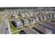 A lovely street view shows a new neighborhood with modern homes, each featuring well-kept lawns at 6404 Pine Fork Aly, St Cloud, FL 34771