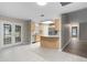 Bright kitchen with stainless appliances, stone countertops, and lots of natural light at 735 Deerfoot Rd, Deland, FL 32720