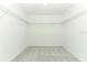 Spacious walk-in closet features wire shelving and neutral carpet at 7367 Capstone Dr, Groveland, FL 34736