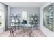Sleek office space with modern desk, shelving, and stylish décor, perfect for a productive work environment at 7404 Capstone Dr, Groveland, FL 34736