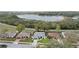 Birds-eye view of houses near a lake at 839 High Pointe Cir, Minneola, FL 34715
