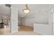 Bright and open living room with views into the kitchen and dining area at 839 High Pointe Cir, Minneola, FL 34715