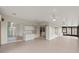 Spacious sunroom with tile flooring, sliding glass doors, and ample natural light at 839 High Pointe Cir, Minneola, FL 34715