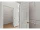 This walk-in closet has shelving and white paint at 839 High Pointe Cir, Minneola, FL 34715