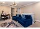 Cozy bonus room with comfortable seating and a game table at 8950 Della Scala Cir, Orlando, FL 32836