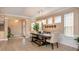 Elegant dining room featuring a decorative chandelier and wainscoting at 8950 Della Scala Cir, Orlando, FL 32836