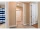 Hallway that has access to a bathroom and storage at 8950 Della Scala Cir, Orlando, FL 32836