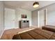 Cozy bedroom featuring two twin beds, dresser with television, and neutral decor at 8962 Sugar Palm Rd, Kissimmee, FL 34747